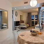 Adam Apartman *